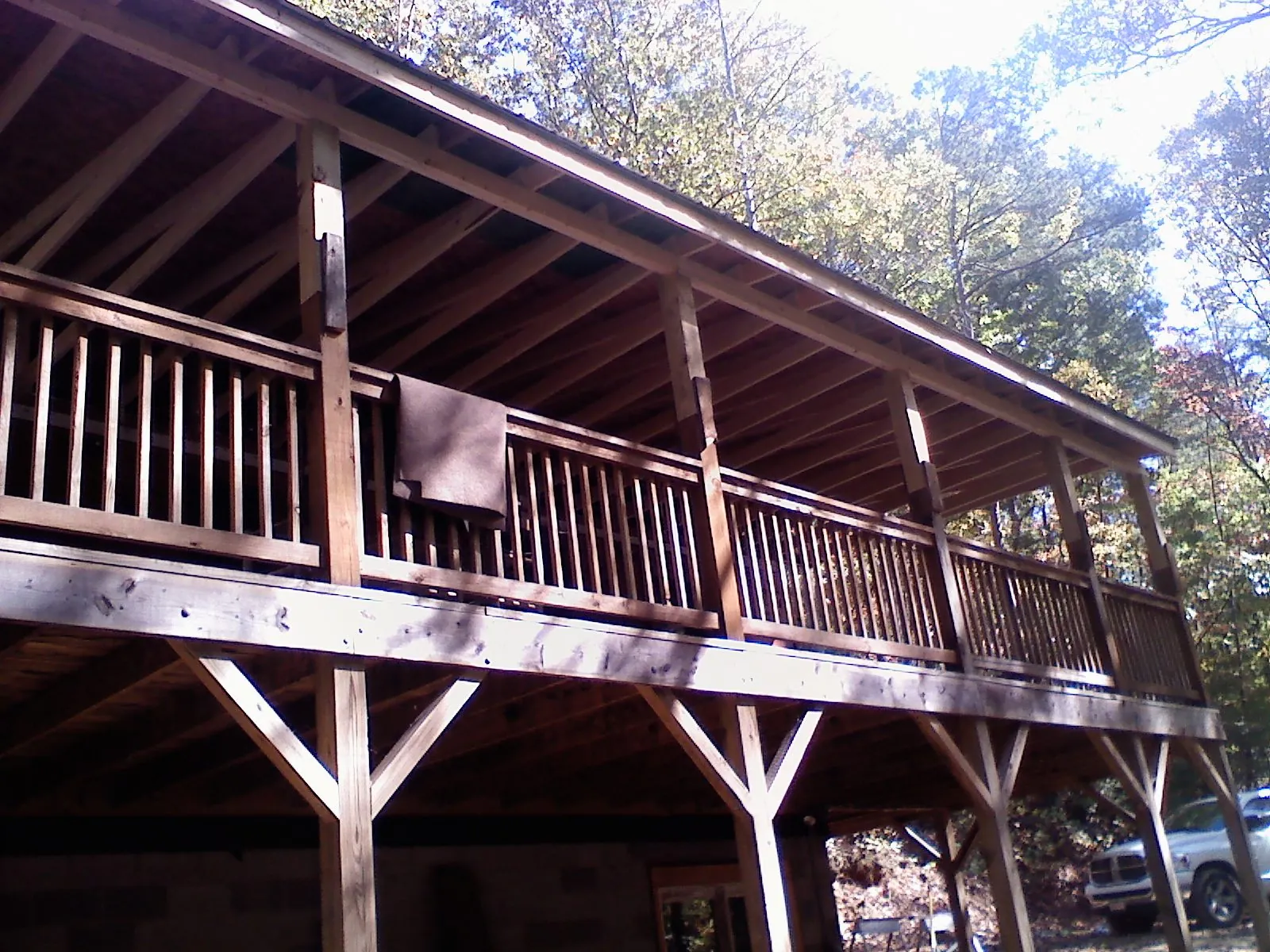 Timber framing under a new elevated porch and deck — Roof Leak Repair in Heber City by Roofing Brothers
